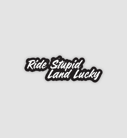 Ride Stupid Land Lucky Sticker