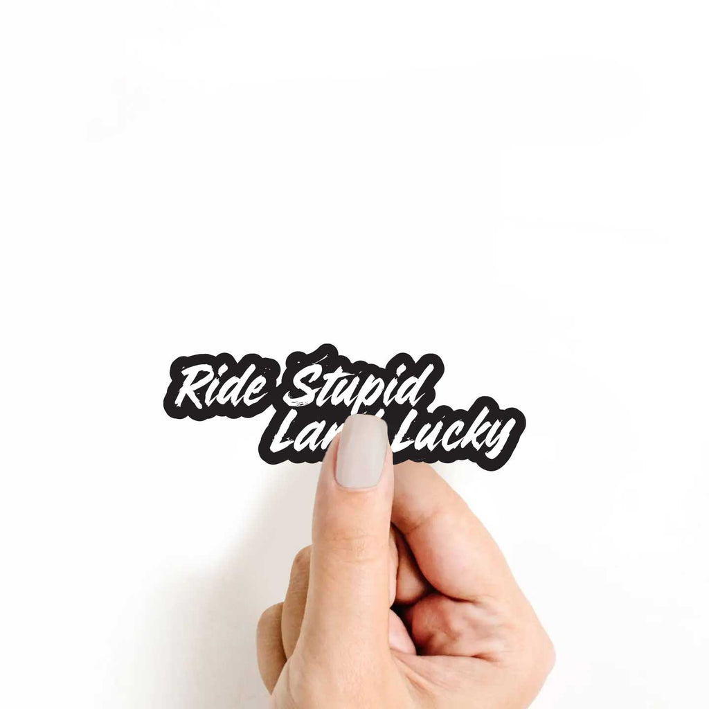 Ride Stupid Land Lucky Sticker